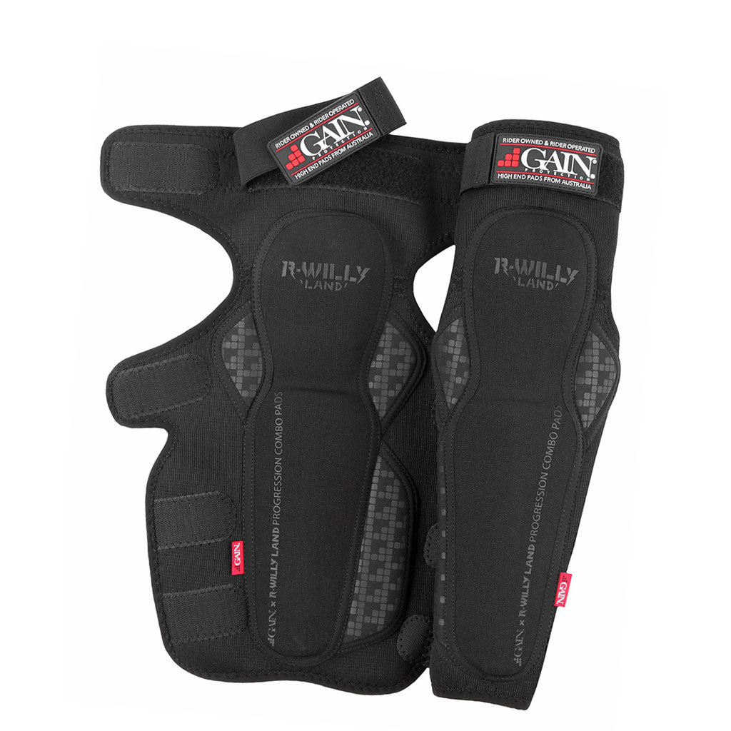 A pair of GAIN x R WILLY LAND "PROGRESSION" V2 Knee/Shin Combo Pads, featuring adjustable straps and branding, inspired by BMX gear from Ryan Williams.