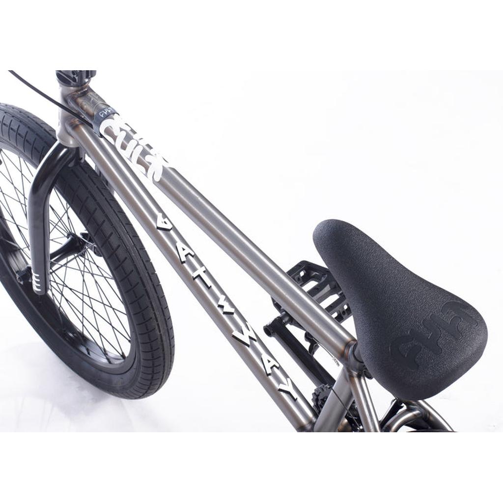Close-up of the Cult Gateway 20 Inch Bike, highlighting the seat, frame with white decals, and rear wheel on a white background.