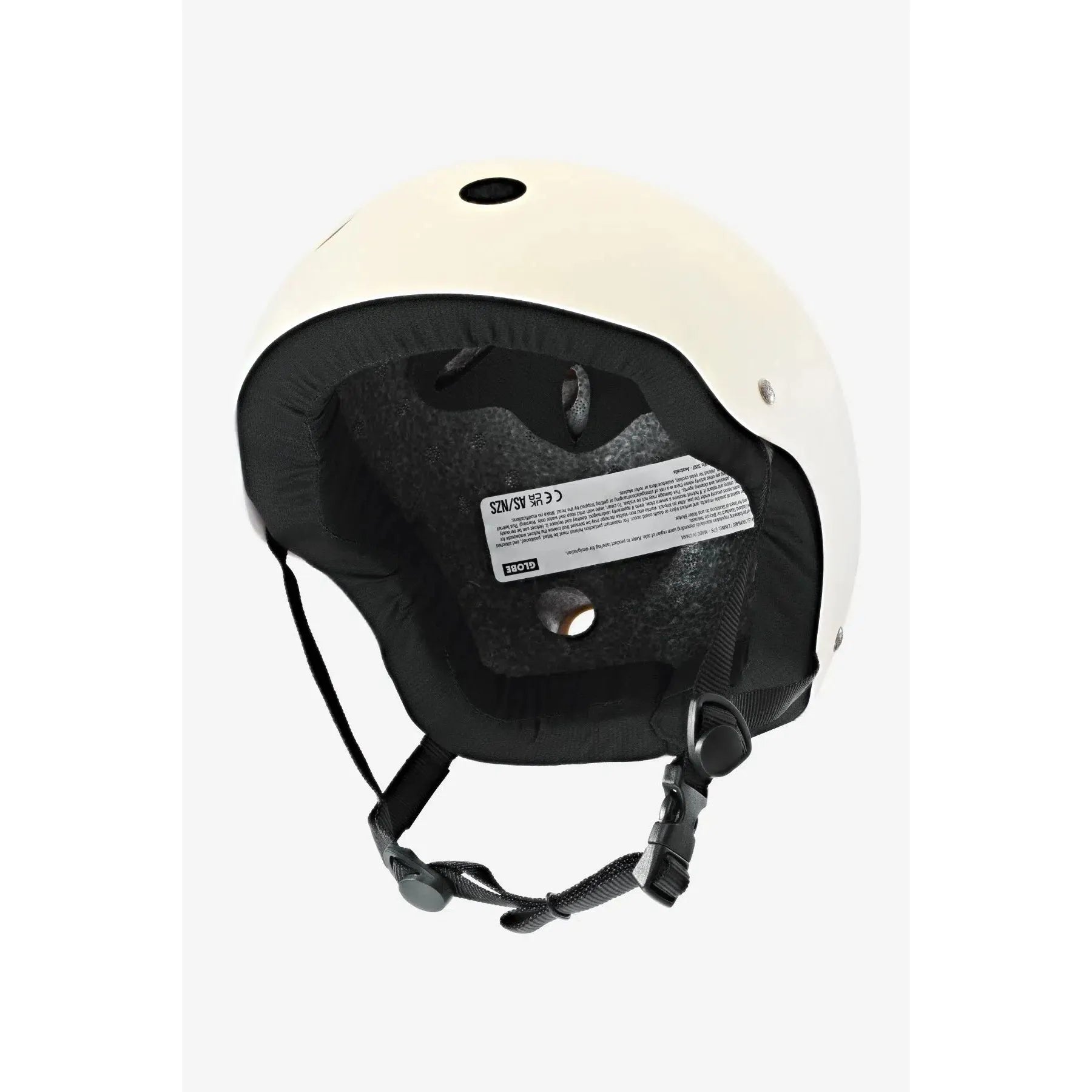 A Goodstock Certified Helmet / Matte Off-White with black interior padding, an adjustable chin strap, EPS foam for added protection, and a label inside showing safety certifications.