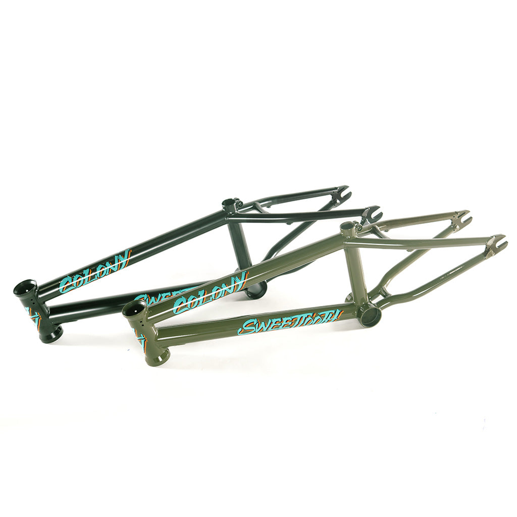 A pair of green Colony 2024 Sweet Tooth 16 Inch Frames from the Sweet Tooth Range by Colony BMX brands on a white background.