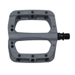The HT PA03A Pedals are gray, flat platform-style bike pedals made from durable nylon-reinforced composite, featuring metal replaceable pins and a threaded axle.