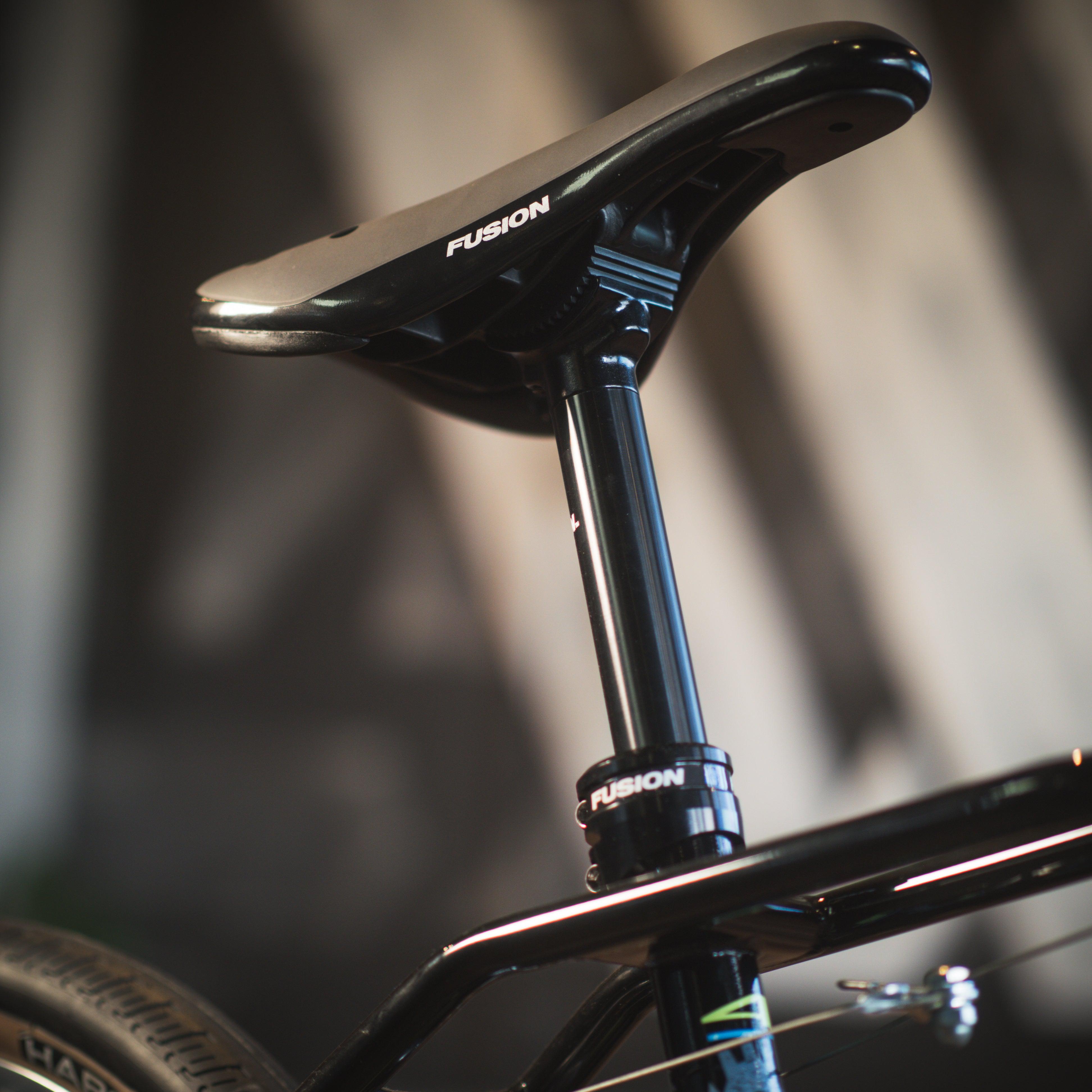 A close up of a Haro Lineage Sport Freestyler Bashguard 20 Bike with a black seat.