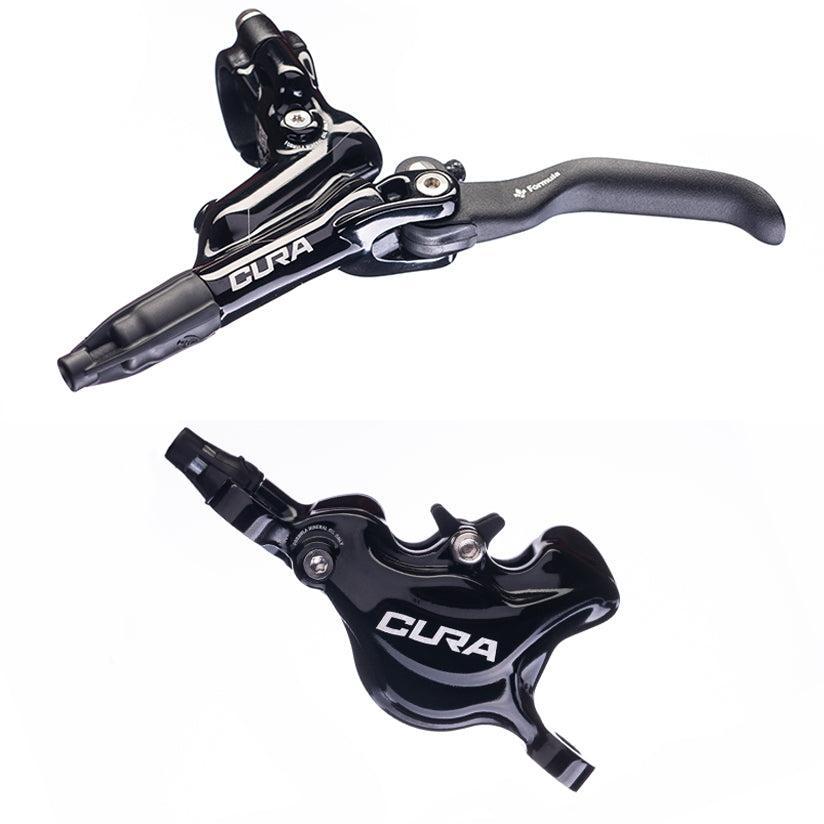 The Formula Cura Disc Brake Kit - Post Mount is shown in black with a brake lever assembly (top) and a two-piston caliper hydraulic brake (bottom), each featuring the "CURA" label, designed for BMX racing.