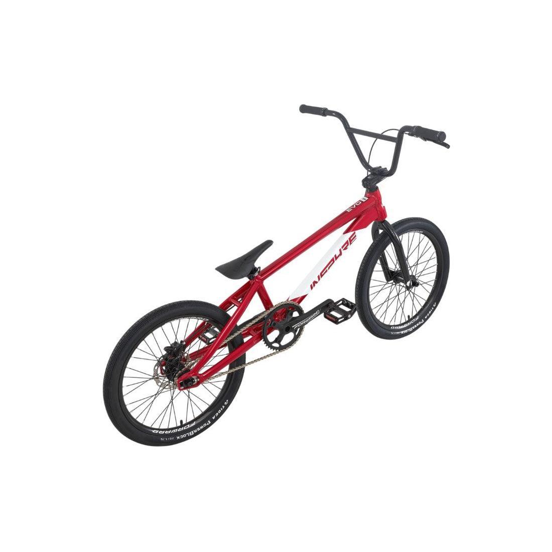 Inspyre EVO Pro L Race Bike (2027) in red, featuring black handlebars, seat, and tires, crafted from lightweight aluminium 6061-T6 and displayed from a rear angle against a white background.