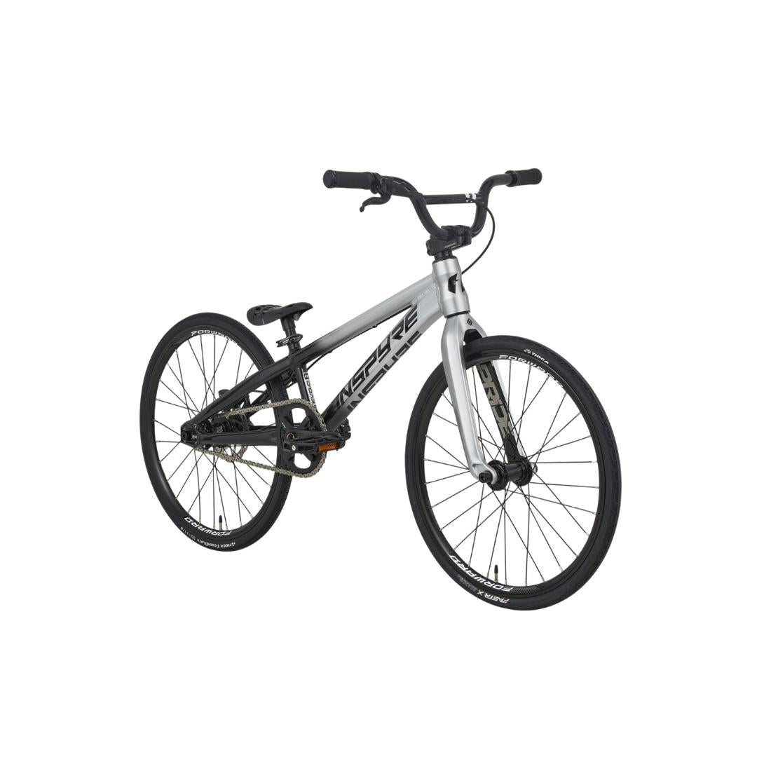 An Inspyre EVO-C Junior Race Bike (2027), BMX-style with a silver frame, black tires, black handlebars, and visible gears—equipped with SD B-85 cranks—is displayed against a plain white background.