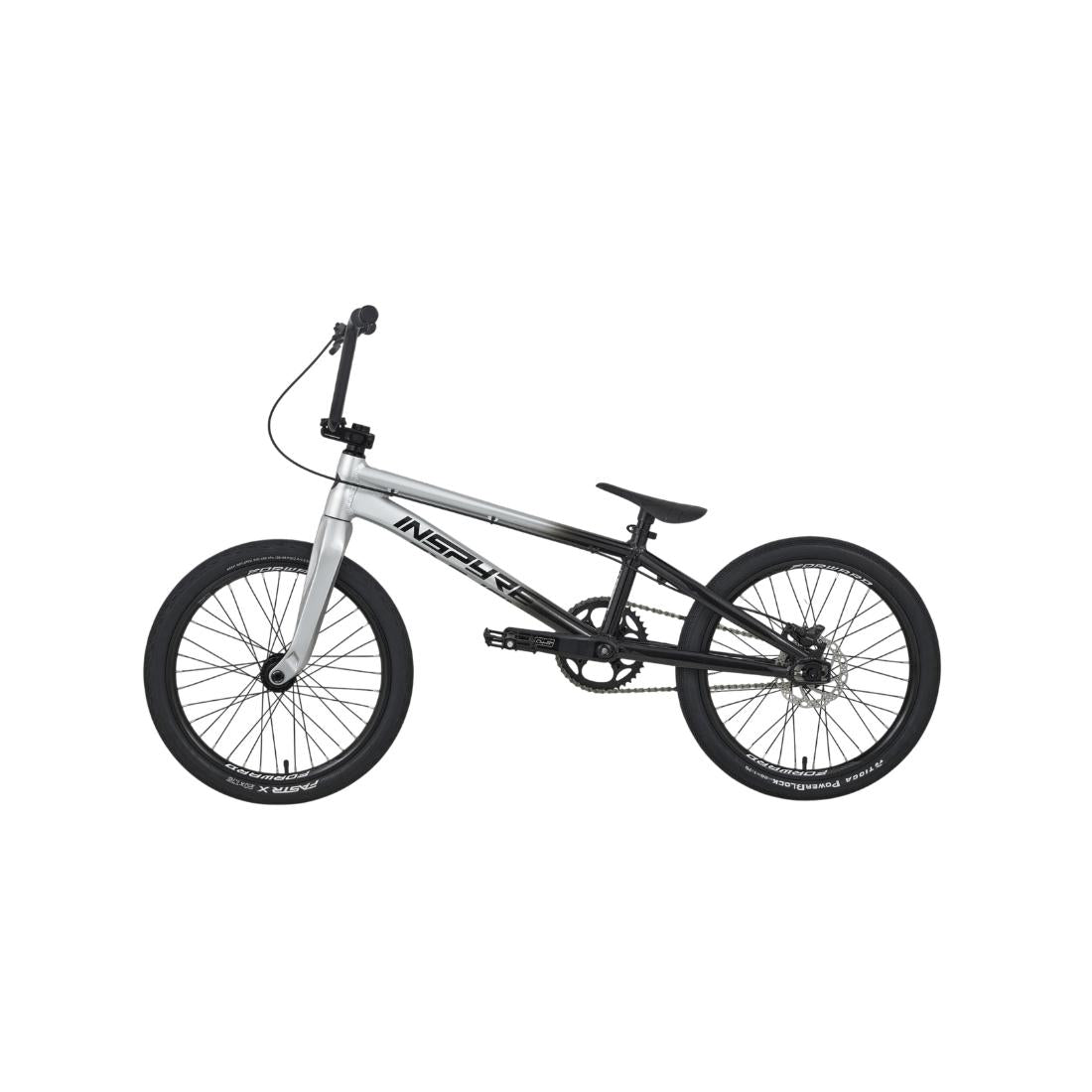 A black and silver Inspyre EVO-C Pro L Race Bike (2027) BMX with a single gear, small frame, and thick tires, shown in profile on a plain white background. This model features SD B-85 cranks and an advanced carbon Pride fork for enhanced performance and durability.
