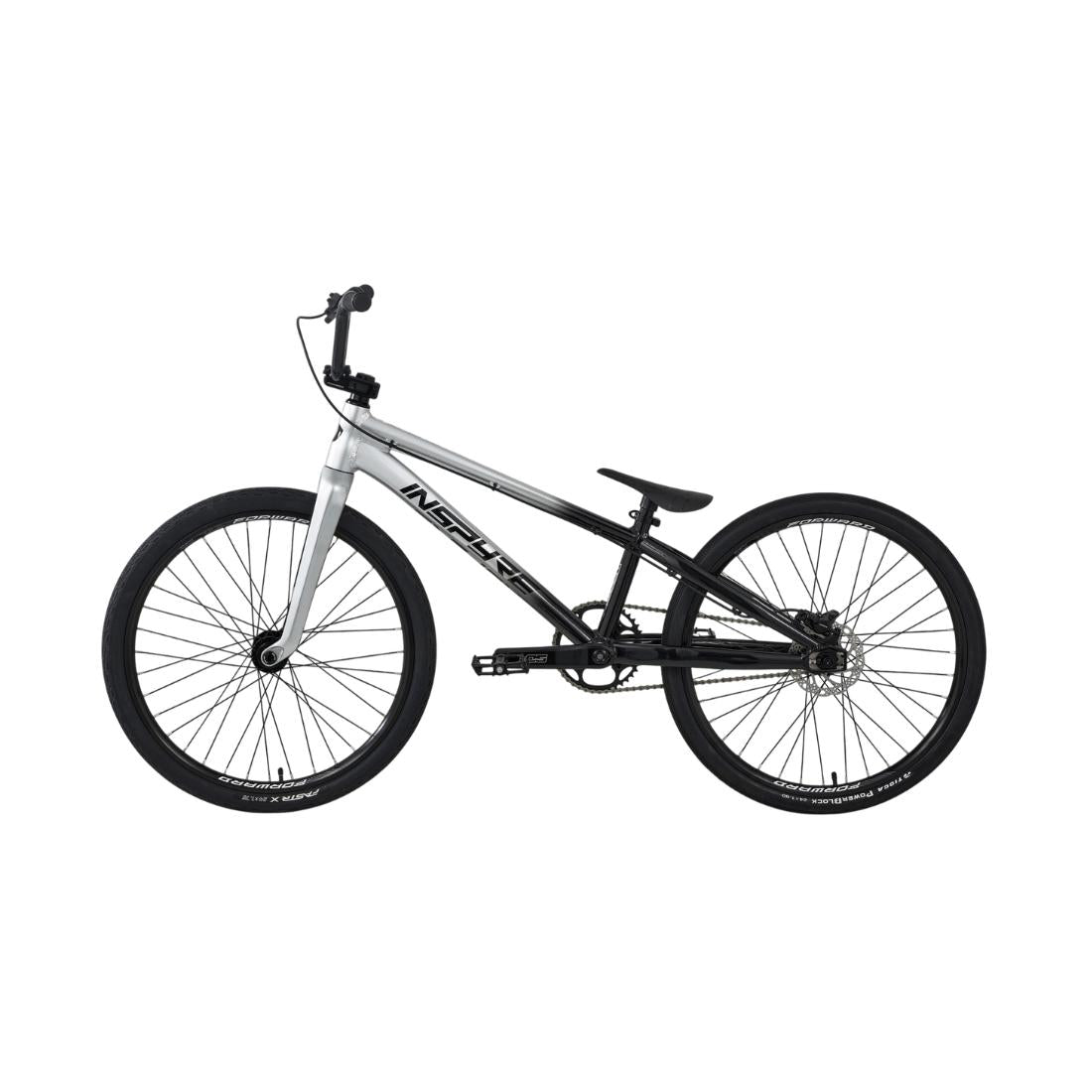 An Inspyre EVO-C Pro Cruiser Race Bike (2027) in black and silver, featuring a lightweight frame, thick tires, and flat handlebars, is shown from the side against a white background. This model comes equipped with premium SD B-85 cranks and an advanced carbon Pride fork for enhanced strength and performance.