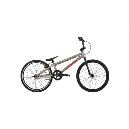 The Inspyre Neo Junior Race Bike (2027) is a beige BMX-style bicycle featuring black wheels, a black seat, and upright handlebars, shown on a white background—an ideal entry-level race bike designed for beginners starting their BMX journey.