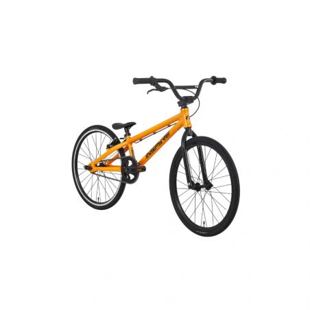 The Inspyre Neo Junior Race Bike (2027), an entry-level BMX-style bicycle in bright orange with black handlebars, seat, and wheels, is shown on a white background—perfect for beginners eager to start racing.
