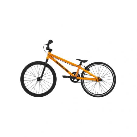 The Inspyre Neo Junior Race Bike (2027) is an orange BMX-style bicycle with black handlebars, seat, and tires, displayed in profile against a plain white background. Designed as an entry-level race bike, it features sealed bearings for smooth performance, making it an ideal choice for beginners starting out in BMX racing.