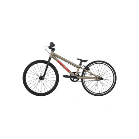 Side view of the Inspyre Neo Mini Race Bike (2027) in beige, featuring black wheels, a black seat, and red accents on the frame. Positioned against a plain white background—perfect for beginner riders seeking an entry-level BMX race bike.