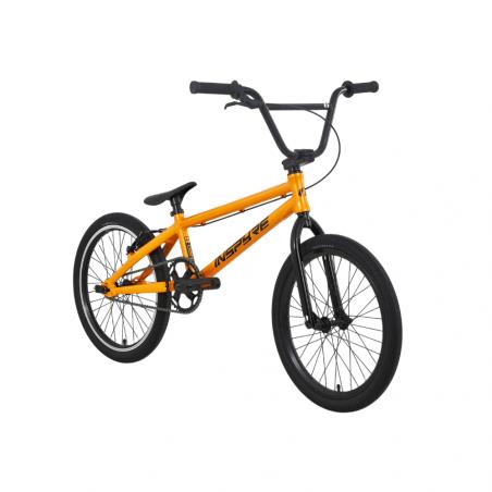 The Inspyre Neo Pro L Race Bike (2027), an entry-level orange BMX with black handlebars, seat, and tires, is displayed at an angle against a plain white background. Part of the Inspyre Neo line, it features sealed hubs for smoother rides and enhanced durability.