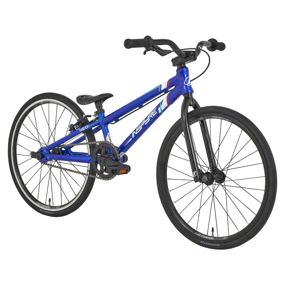 The Inspyre Neo Mini Bike 2025 is a blue BMX race bike with black handlebars, seat, and tires, shown from a front side angle on a white background—ideal for kids or entry-level BMX racing.