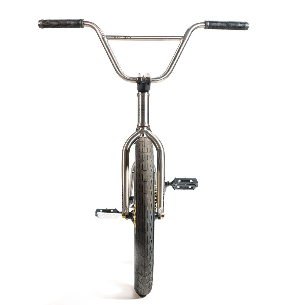 Front view of an ION BMX TiXX 20 Inch Bike with a titanium frame, black handlebars, and black pedals.