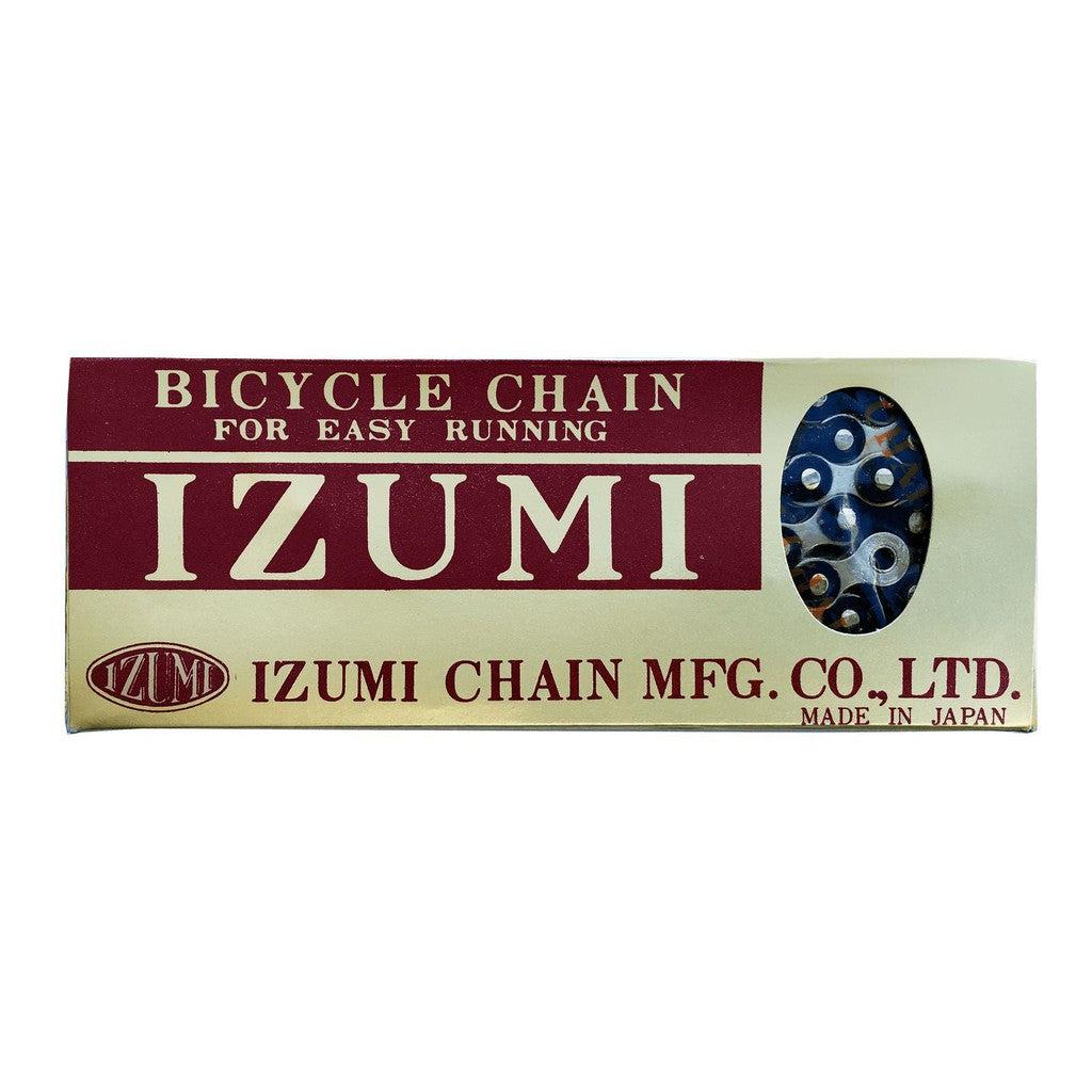Izumi 1/2 x 1/8 Inch Chain packaging with a partial view of the chain inside; text indicates it is made in Japan by Izumi Chain MFG. Co., Ltd., renowned for producing high-quality track and durable BMX chains.