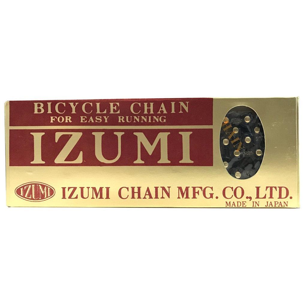 Rectangular gold and red box labeled “IZUMI” containing a high-quality Izumi 1/2 x 1/8 Inch Chain, with text indicating it is made in Japan by Izumi Chain MFG. Co., Ltd.—perfect as a robust track chain or reliable BMX chain.