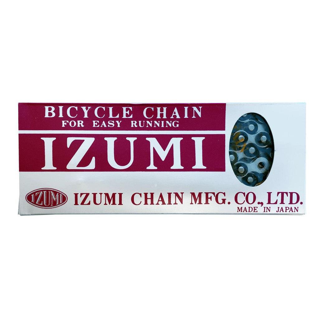 Box of Izumi 1/2 x 1/8 Inch Chain with a small window displaying the chain, labeled “IZUMI CHAIN MFG. CO., LTD. Made in Japan,” and “Bicycle Chain for Easy Running.” Renowned for its smooth performance, this Izumi chain is perfect as a reliable BMX or track chain.