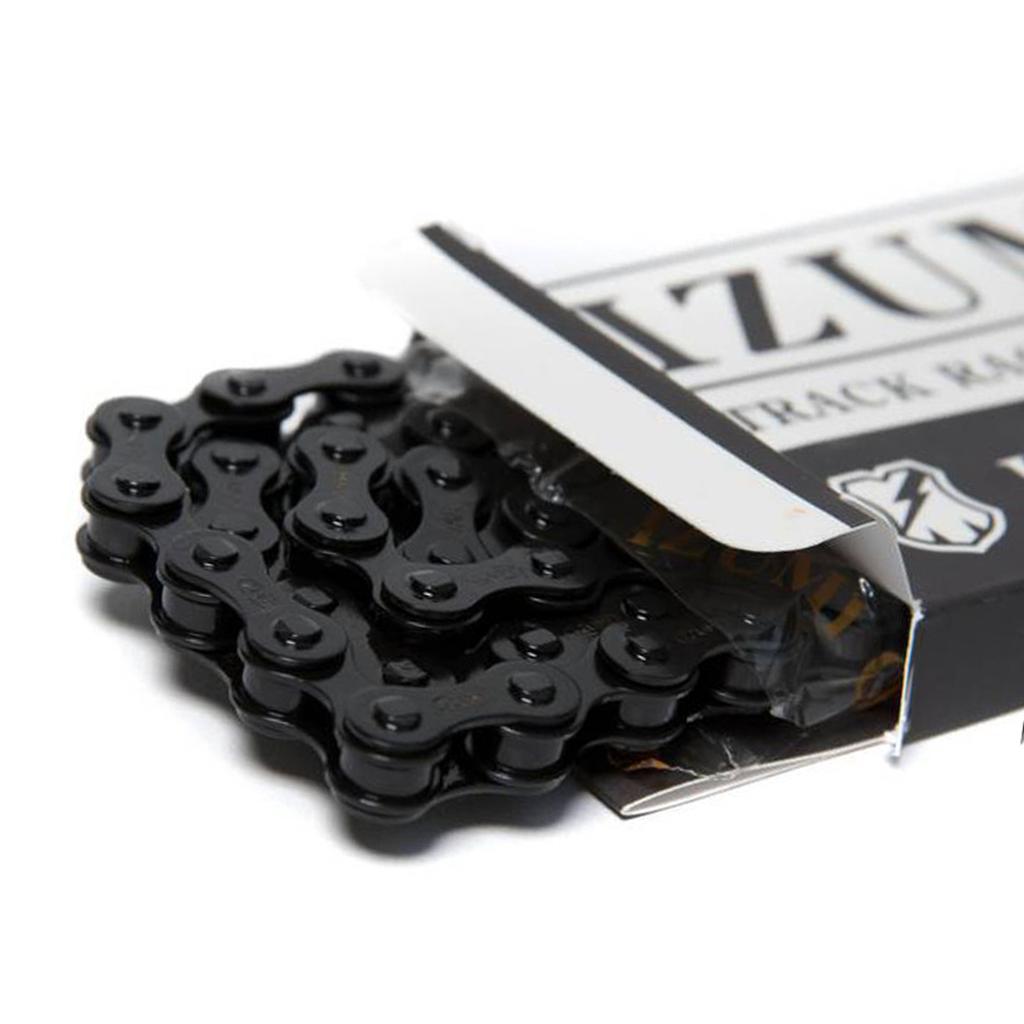 The Izumi Mash Chain, shown in black and partially removed from its branded box with the lid open—ideal for track or fixed gear bikes.