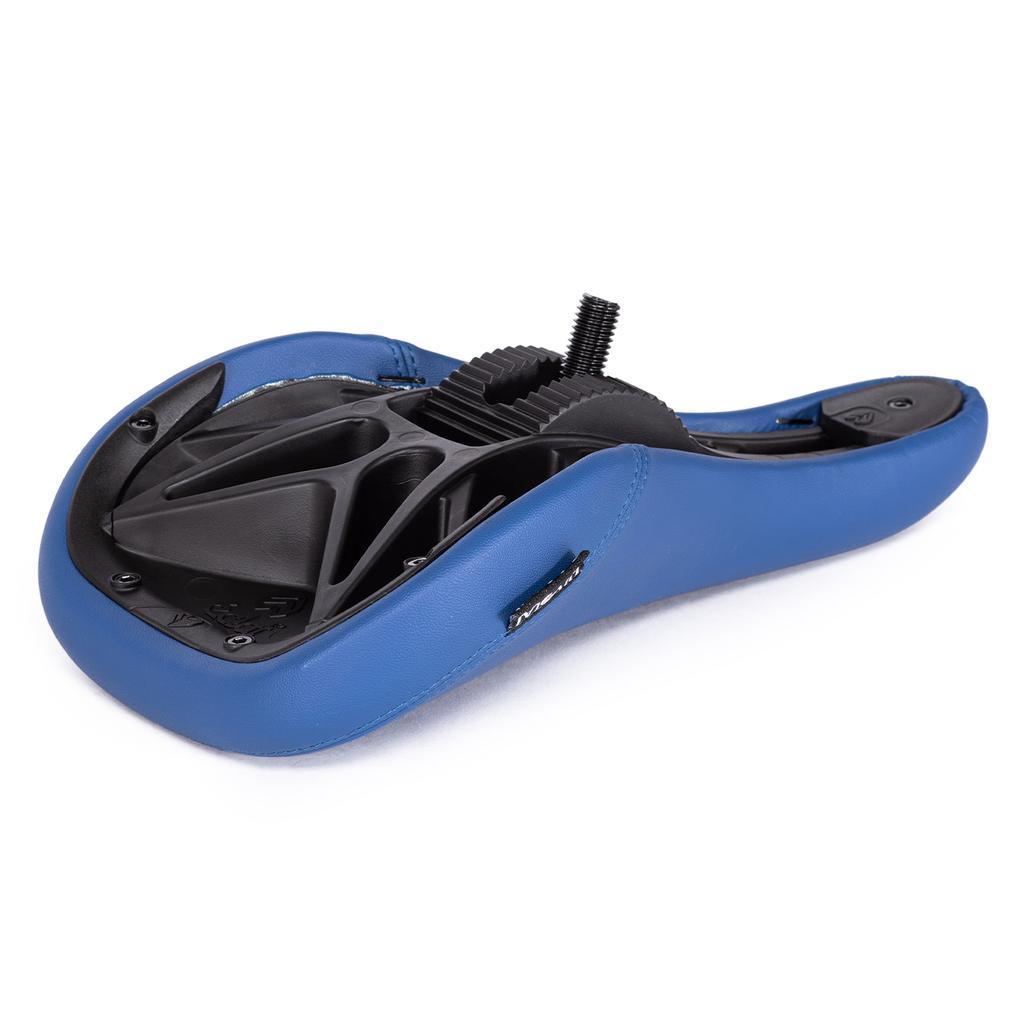 The Eclat Bios Fat Pivotal Seat in blue is pictured upside down, highlighting its black plastic underside, central mounting bolt, and the distinctive Pivotal technology for BMX bikes.
