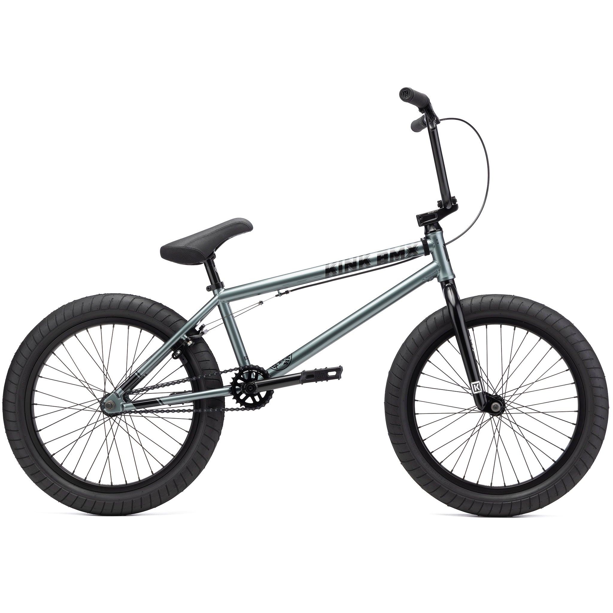 A Kink Whip XL 20 Inch Bike with a silver Chromoly frame, black handlebars, black seat, and thick black tires.
