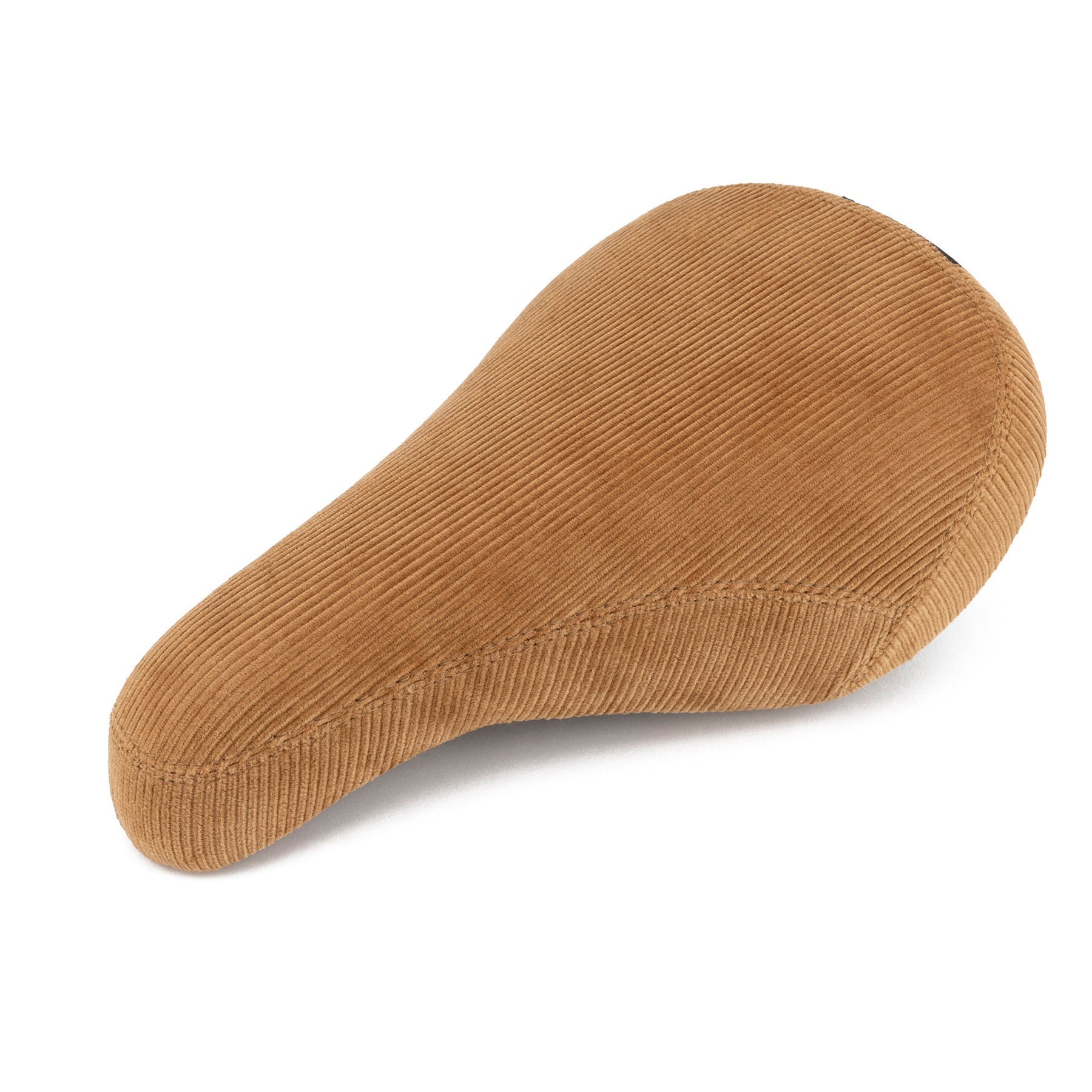 A brown corduroy bicycle saddle, the Kink Williams Stealth Pivotal Seat, is shown on a white background.