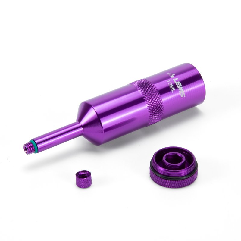 Purple metal tool resembling a syringe, featuring a detachable cap and base, labeled "10ML" under the product name Lewis Portable Oil Funnel.