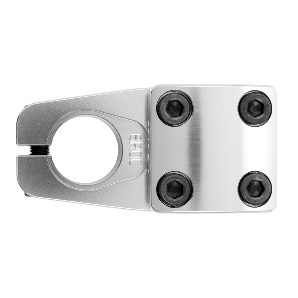 The Odyssey Broc Raiford V2 Stem is a silver, top-load BMX stem with a four-bolt faceplate and sideways clamp opening, perfect for securely mounting your BMX handlebar.