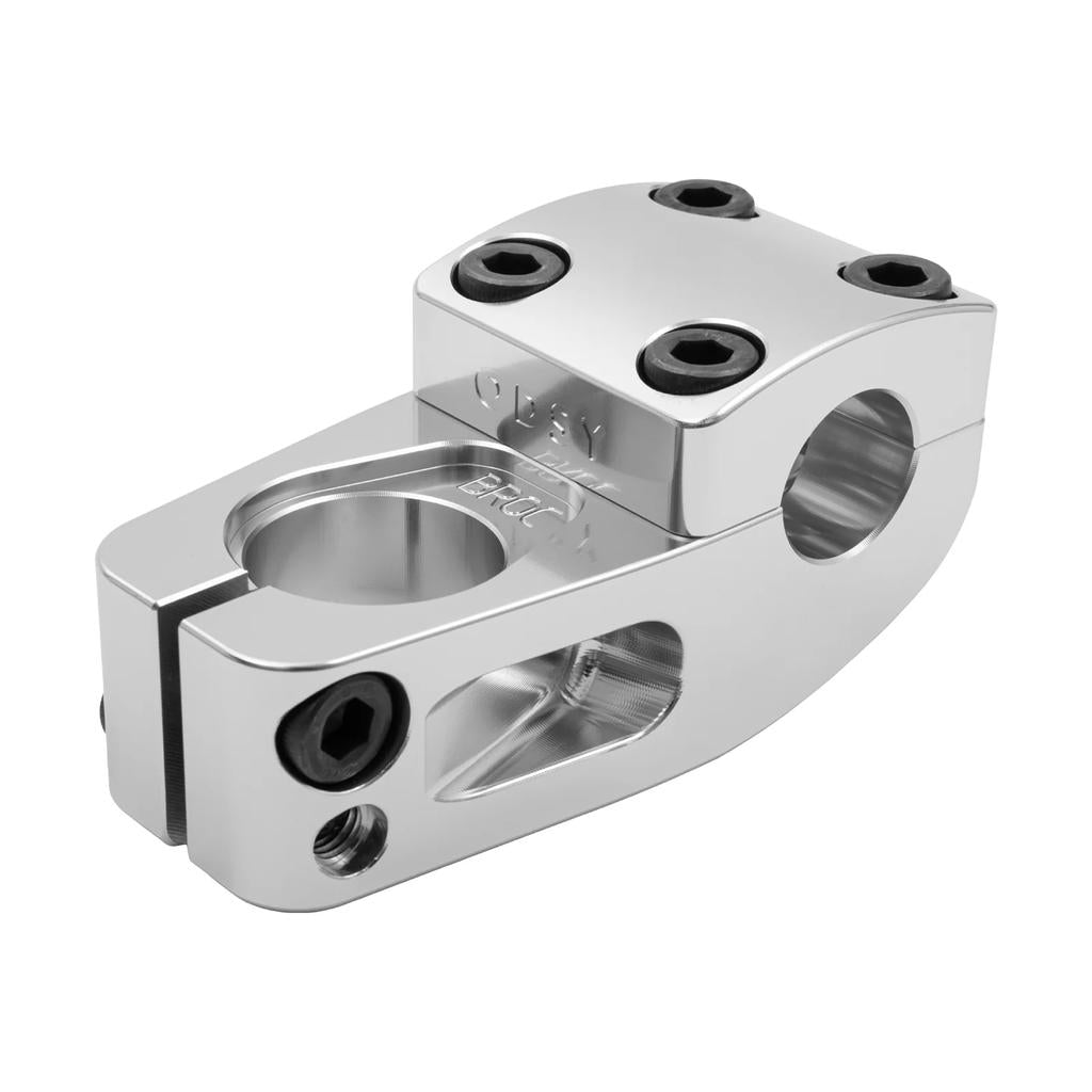 The Odyssey Broc Raiford V2 Stem is a polished metal BMX stem featuring multiple black bolts and precision-cut details, designed to securely attach handlebars to your bike’s fork.