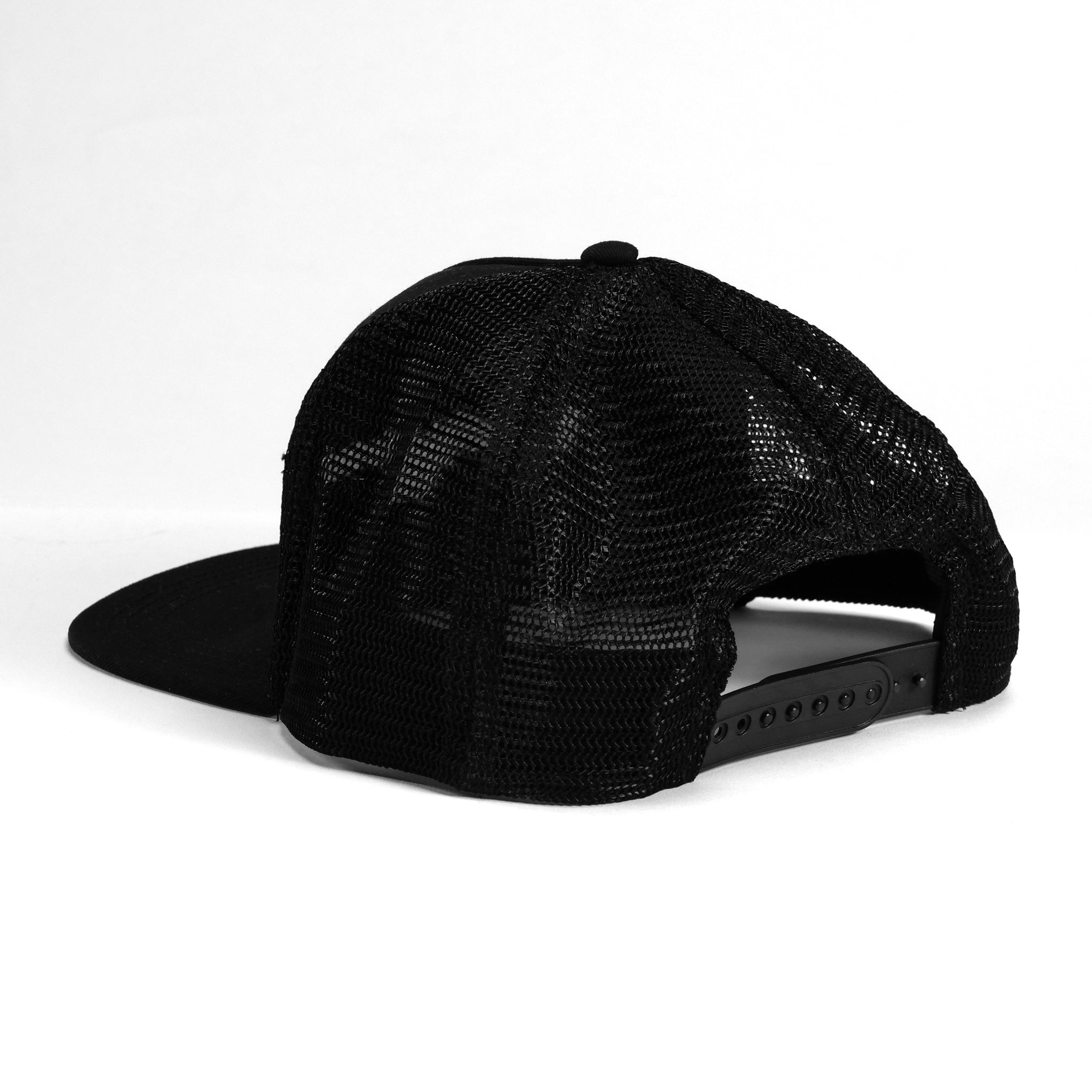 The LUXBMX Bicycle Motocross Trucker Cap Black features a black mesh design with a snapback closure, viewed from the back against a white background. Ideal for BMX enthusiasts.