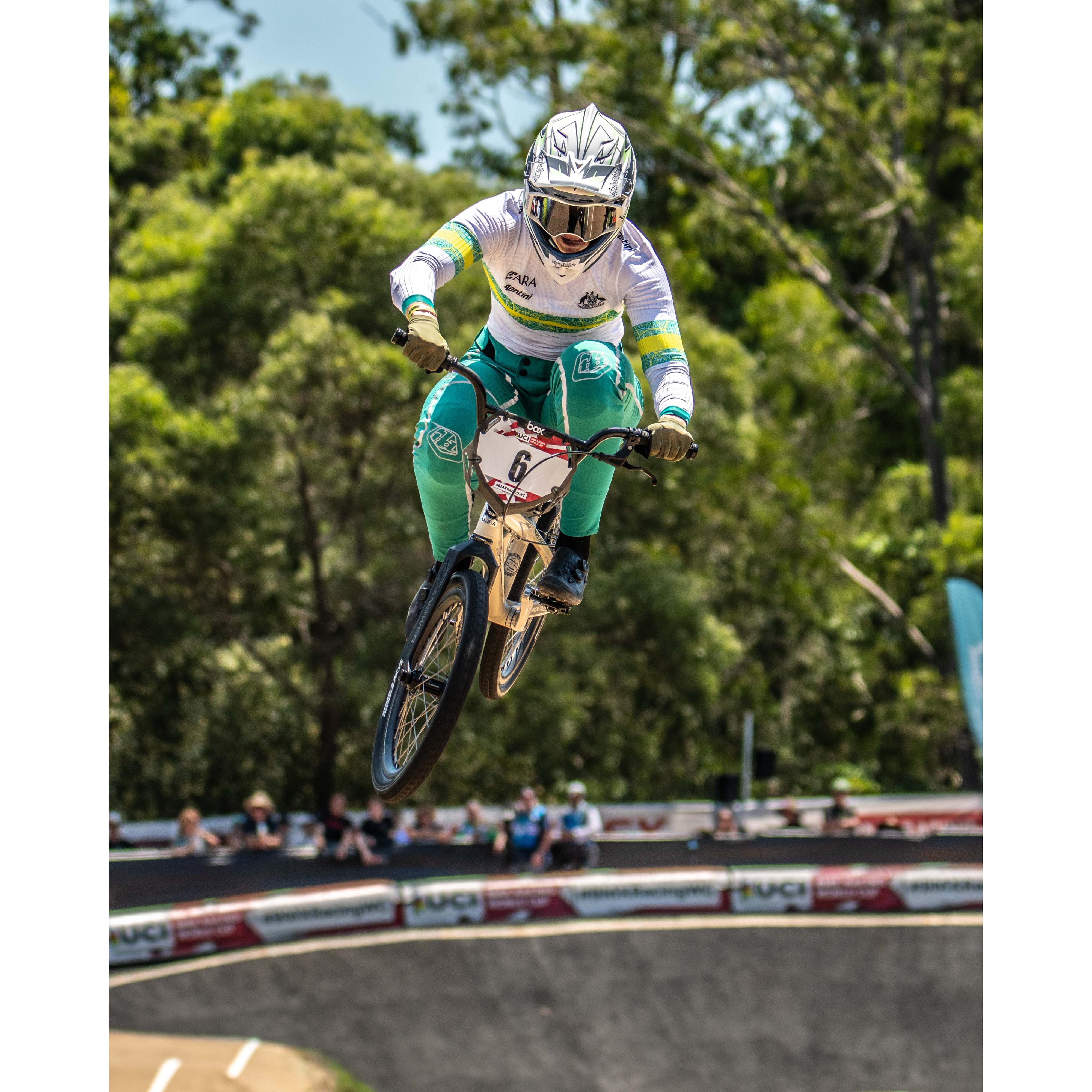 Capture epic race moments with the LUXBMX Race Photo Packages – Lake Macquarie National Series May 2025, featuring airborne riders in vibrant uniforms against scenic outdoor tracks and enthusiastic crowds.