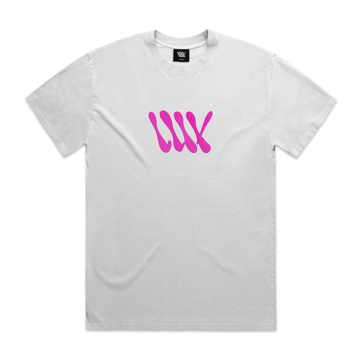 The LUXBMX Slime Time Tee in Faded White is a plain heavyweight shirt featuring a pink "LUX" logo on the front, bringing back that 90s vibe.