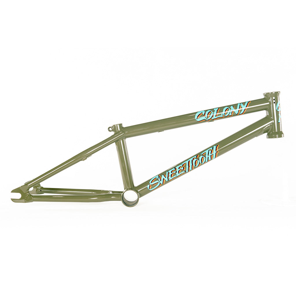 A green Colony 2024 Sweet Tooth 16 Inch frame with the word BMX on it from Colony BMX.