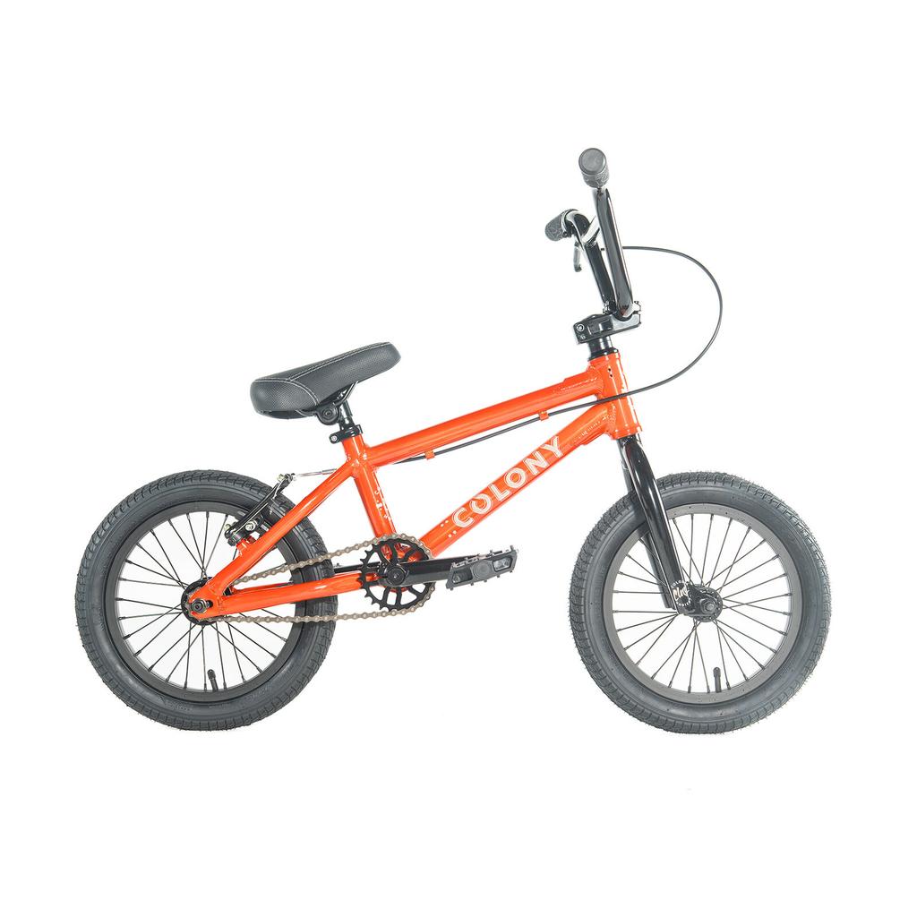 The Colony Horizon 14 Inch Bike is a small orange BMX with black handlebars, seat, and tires, shown from the side on a white background—perfect for young riders aiming to become Freestyle Olympic athletes.