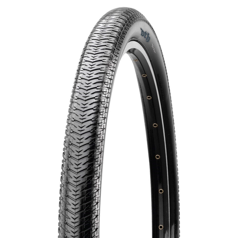 Close-up image of a black bicycle tire with a textured tread pattern and small holes along the rim, showcasing the durability of Maxxis DTH Wire Bead 20 Inch Tyre.