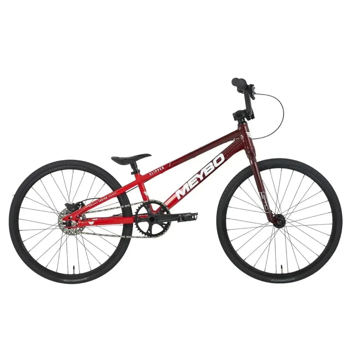 The Meybo 2025 Clipper Junior Bike, an entry-level race BMX, features a sleek red and black frame with straight handlebars and thin tires, set against a white background.