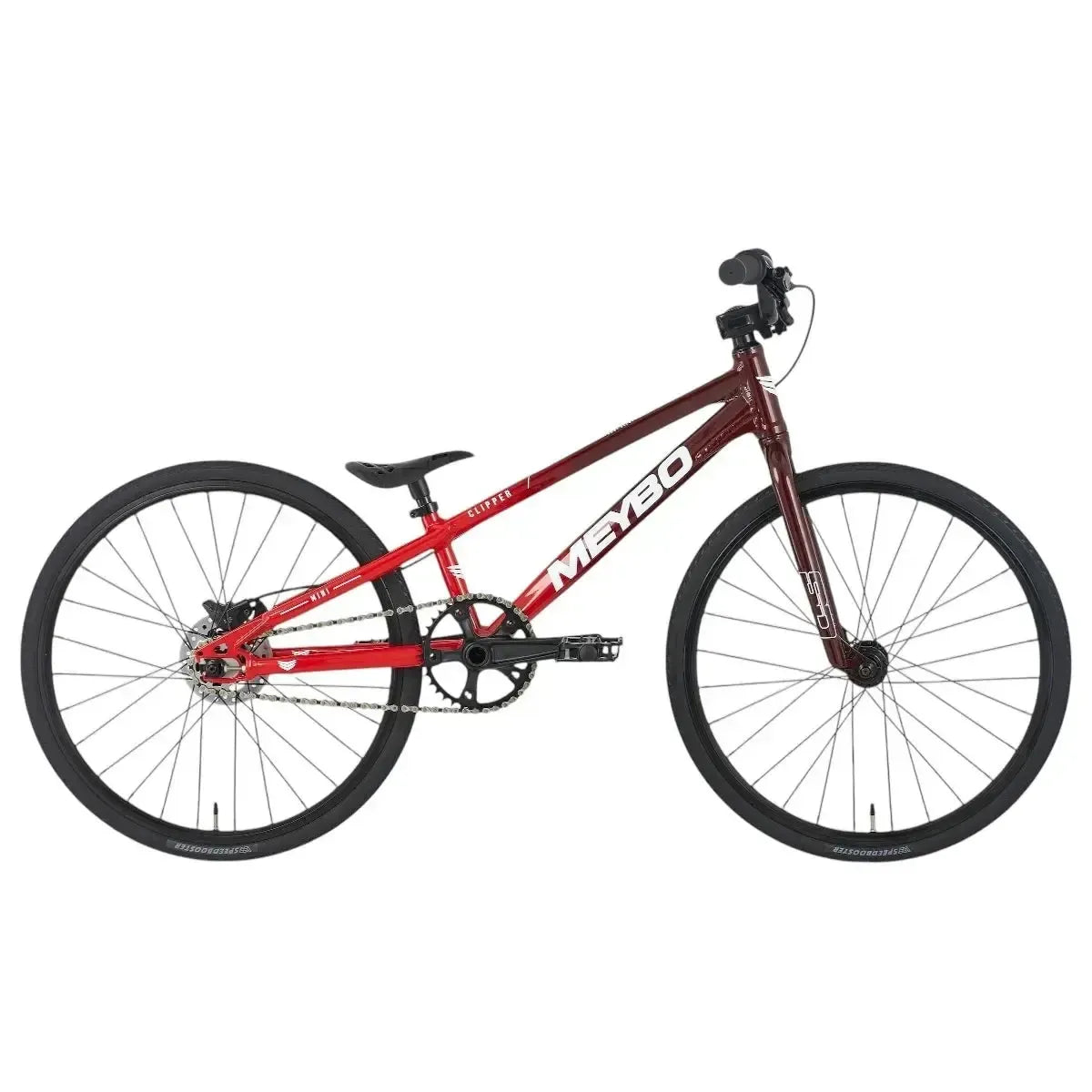 The Meybo 2025 Clipper Mini Bike features a red frame, black tires, and a single gear, resembling the BMX race-inspired design with its compact build and straight handlebars, ideal for BMX racing.