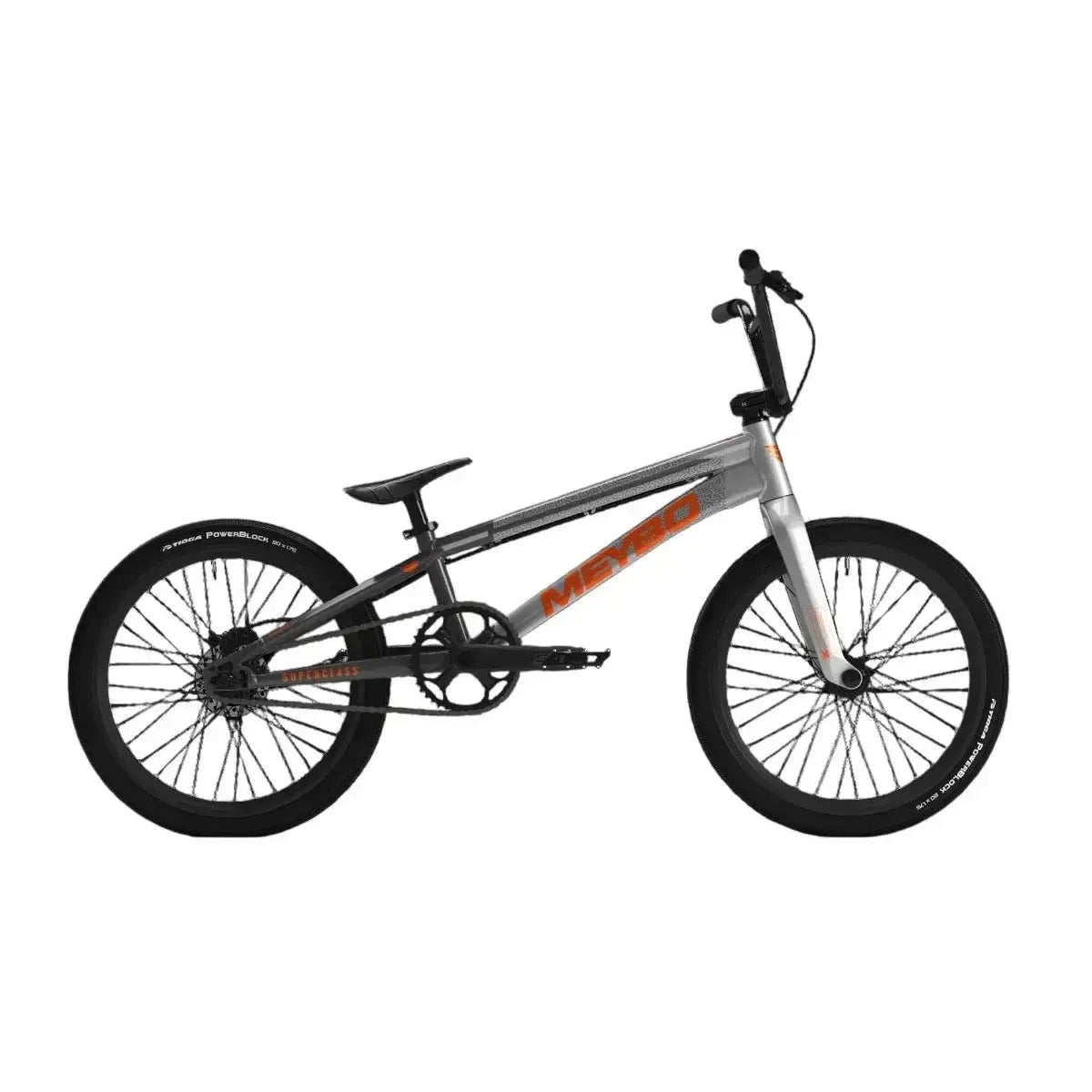 The Meybo 2025 Superclass Pro XXL BMX bike features a sleek silver and black frame with eye-catching orange graphics, black wheels, and handlebars. Ideal for freestyle or stunt riding, it offers optimal control with Shimano hydraulic disc brakes.