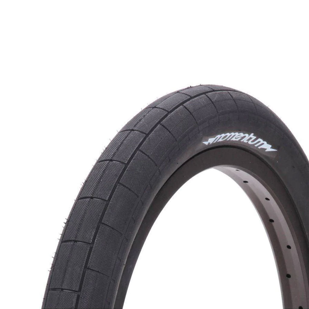 A black Demolition Momentum Tyre on a white background.