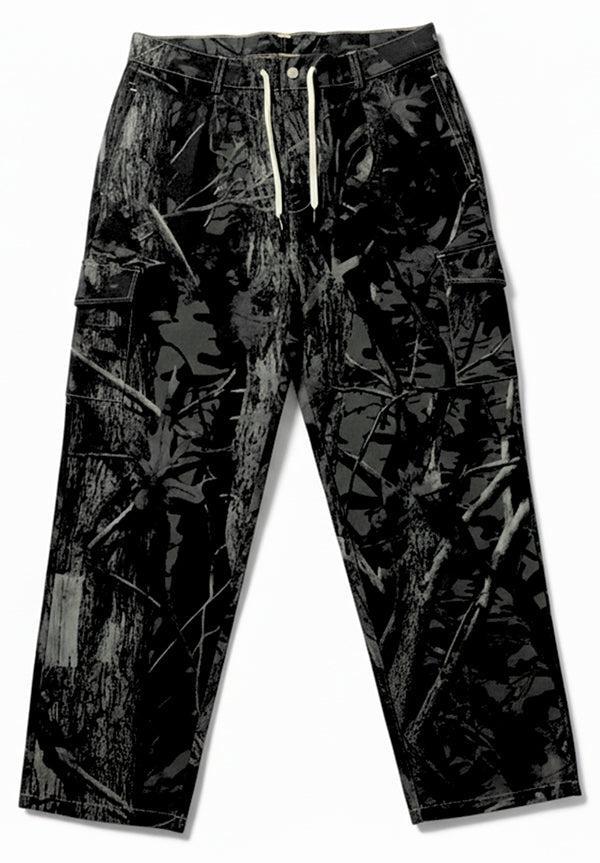 Monticule Ocean Park Cargo Pants in dark camo with white waist drawstring and side pockets, crafted with Dura-flex technology for durability and comfort, shown laid flat on a white background.