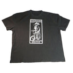 The Nothing’s Wrong Plague T-Shirt is a black BMX tee with a white cloaked unicyclist graphic, "NOTHING'S WRONG" and "MMXXI" text, and is hand-printed for unique style.