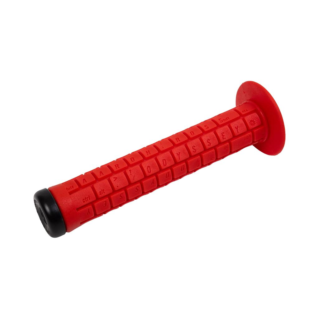 The Odyssey Aaron Ross Grips are red bicycle handlebar grips inspired by computer keyboards, featuring raised keys, black end caps, a soft feel, and a 145mm length for comfort and control.