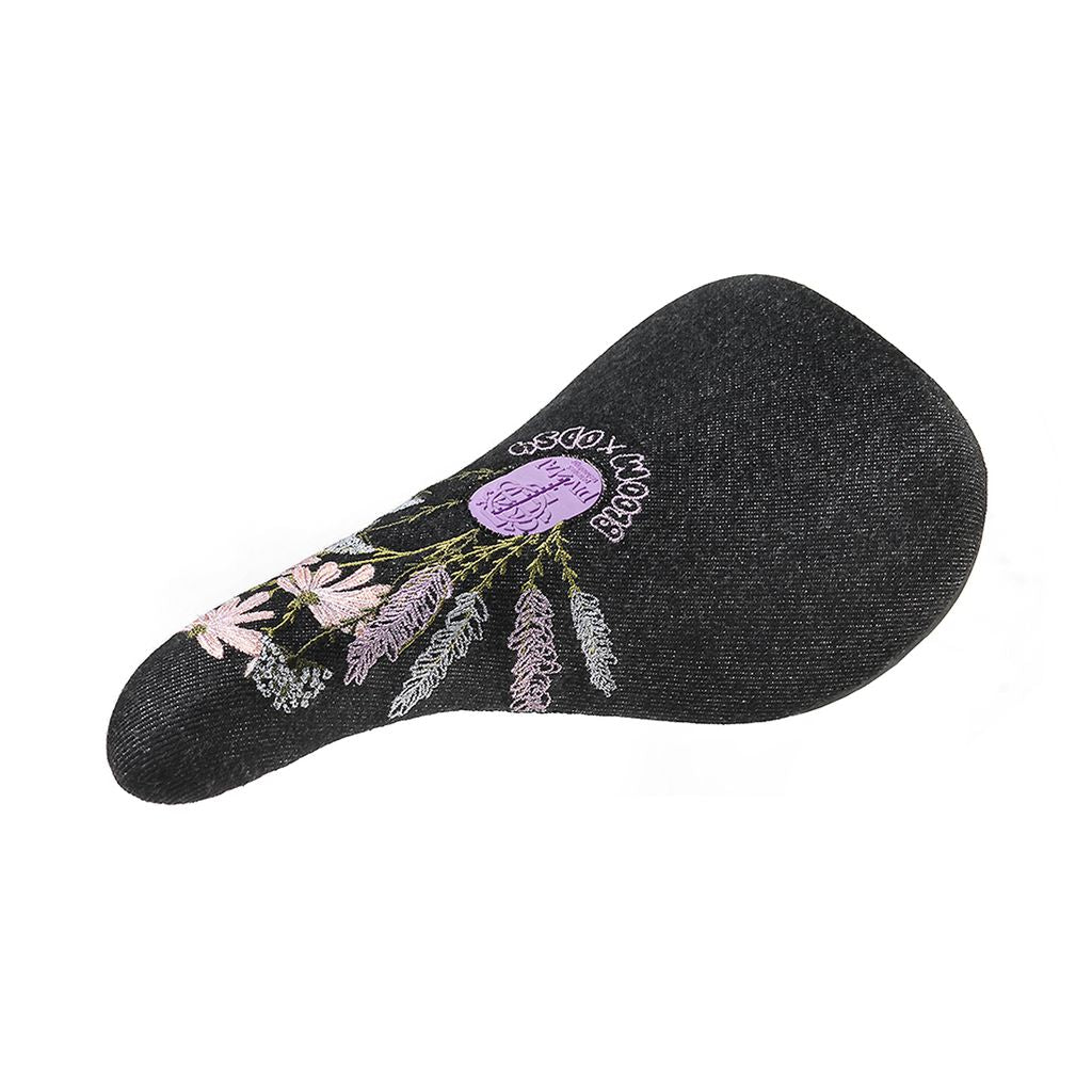 Odyssey Bloom Pivotal Seat with embroidered flowers in pink and purple tones, isolated on a white background.