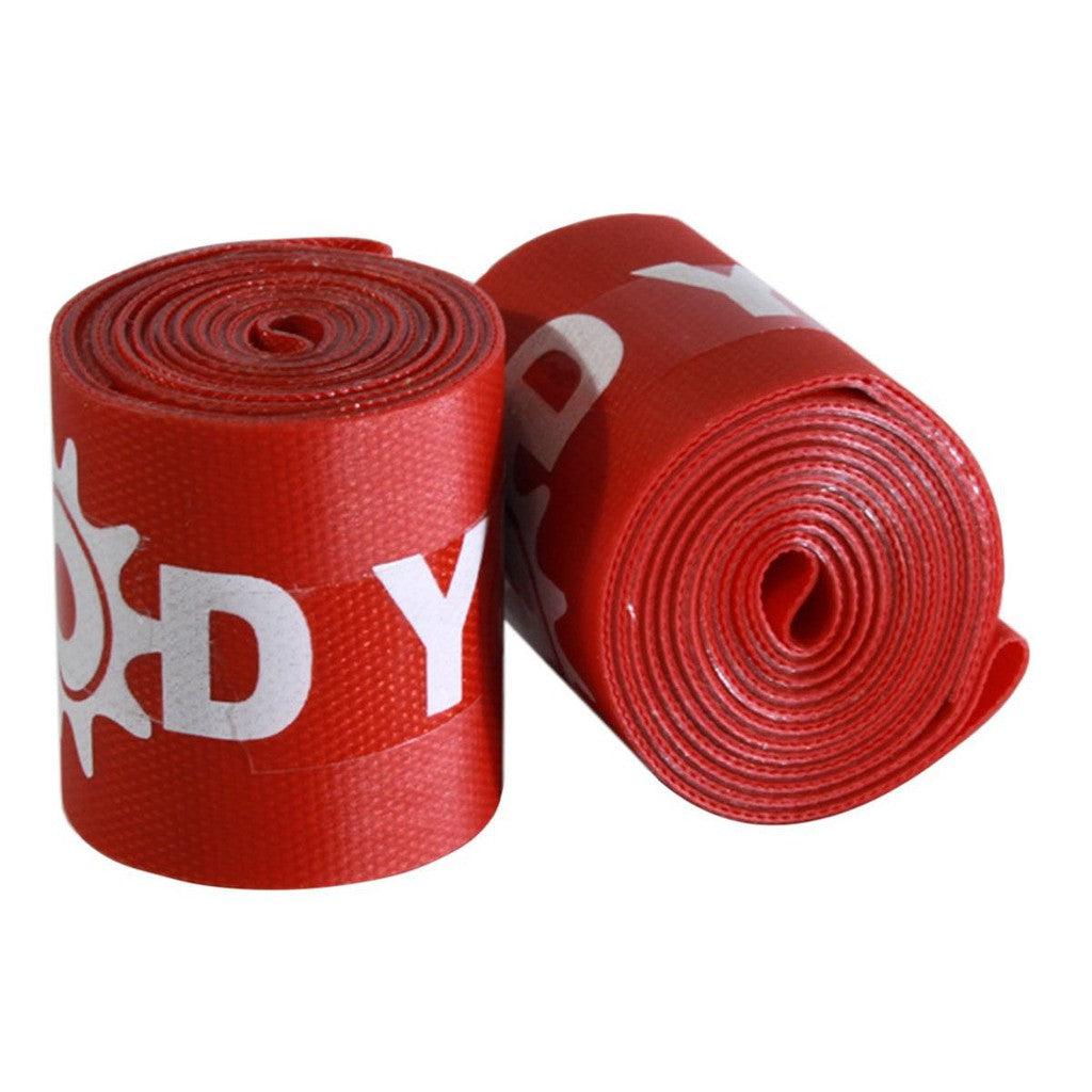 Two Odyssey Logo Rim Strips, each with red coloring and white text featuring partial gear designs, are rolled up side by side. These rim strips are perfect for BMX rims and provide excellent flat protection for your bicycle.