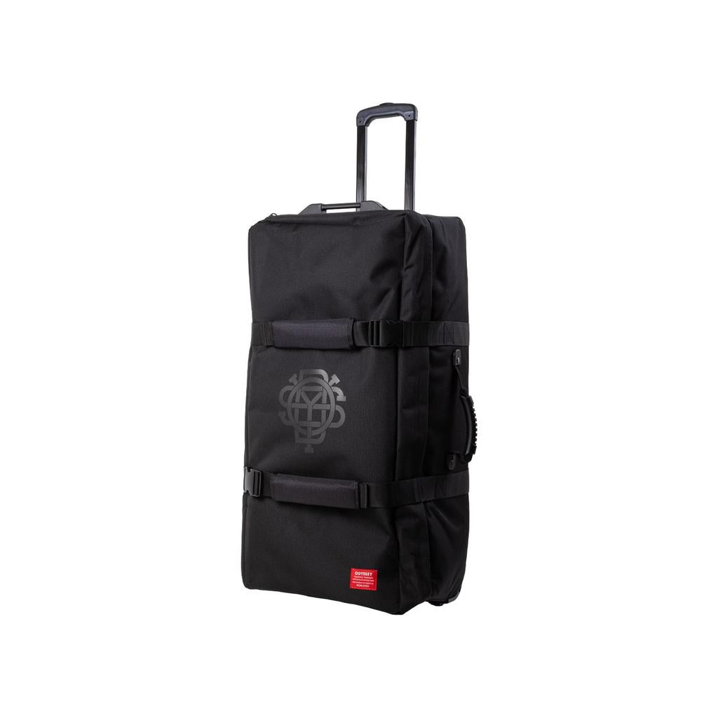 The Odyssey Traveler Pro Bike Bag, in large black, features wheels, retractable and side handles, plus an abstract logo—perfect for transporting freestyle BMX bikes.