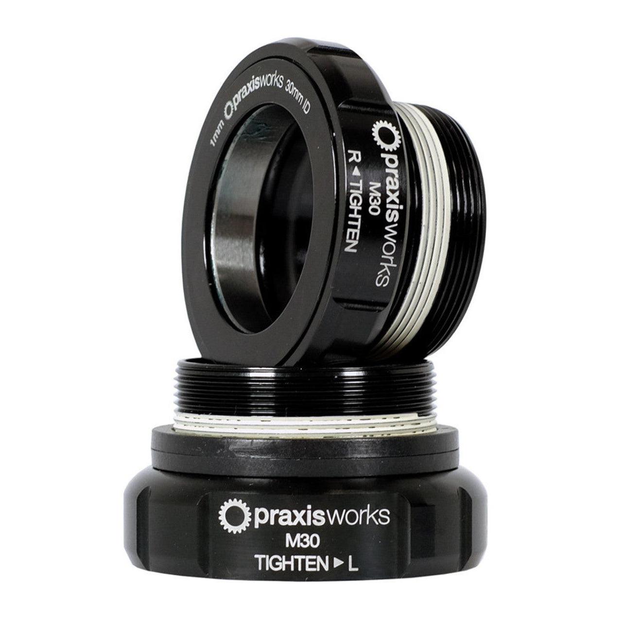 Two Praxis Works M30-BSA Euro Bottom Bracket Kits (OEM) in black, intended for BSA threaded frames, are accurately labeled with tightening instructions.