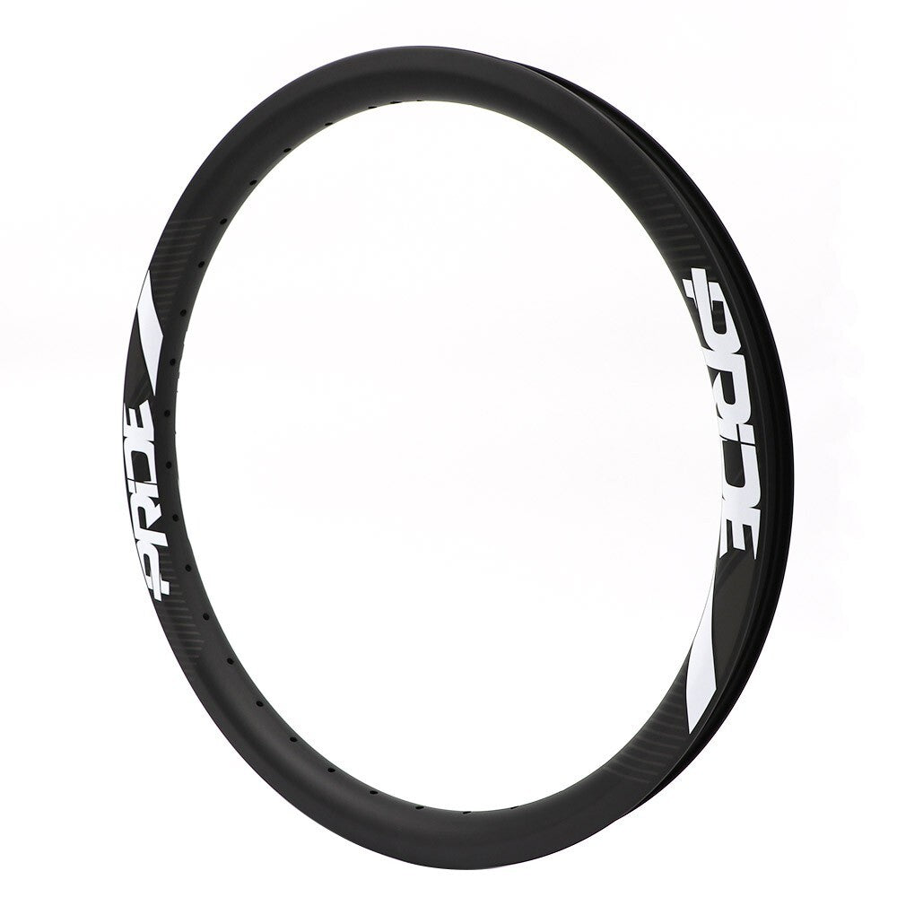 The Pride Carbon Gravity Aero Pro 20 Inch Rim 36H UD is a sleek black BMX racing rim with the white PRIDE logo, crafted from premium carbon.