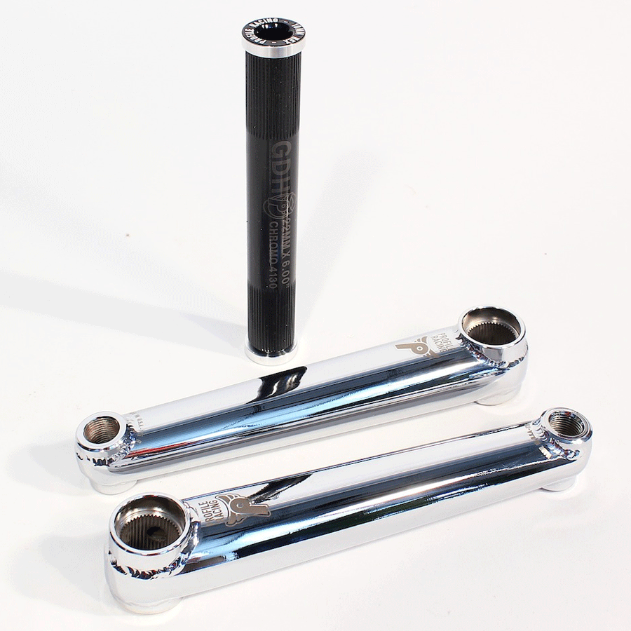 A set of shiny silver PROFILE Column Cranks and a black spindle, placed on a white surface, ensuring durability and performance.
