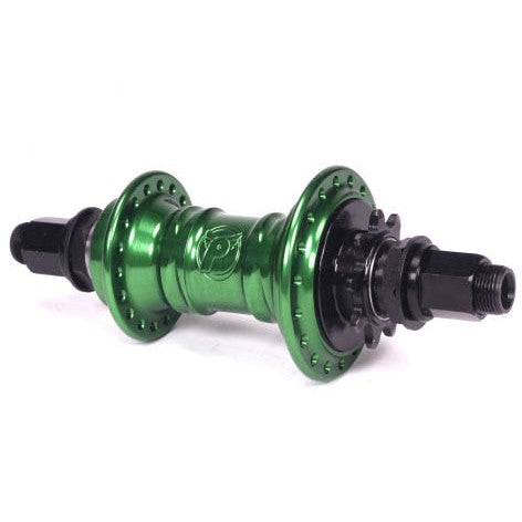 The Profile Mini Rear Cassette Hub, a green BMX hub with black threaded axles, is displayed against a white backdrop, showcasing its sleek low-flange design that embodies sophistication.