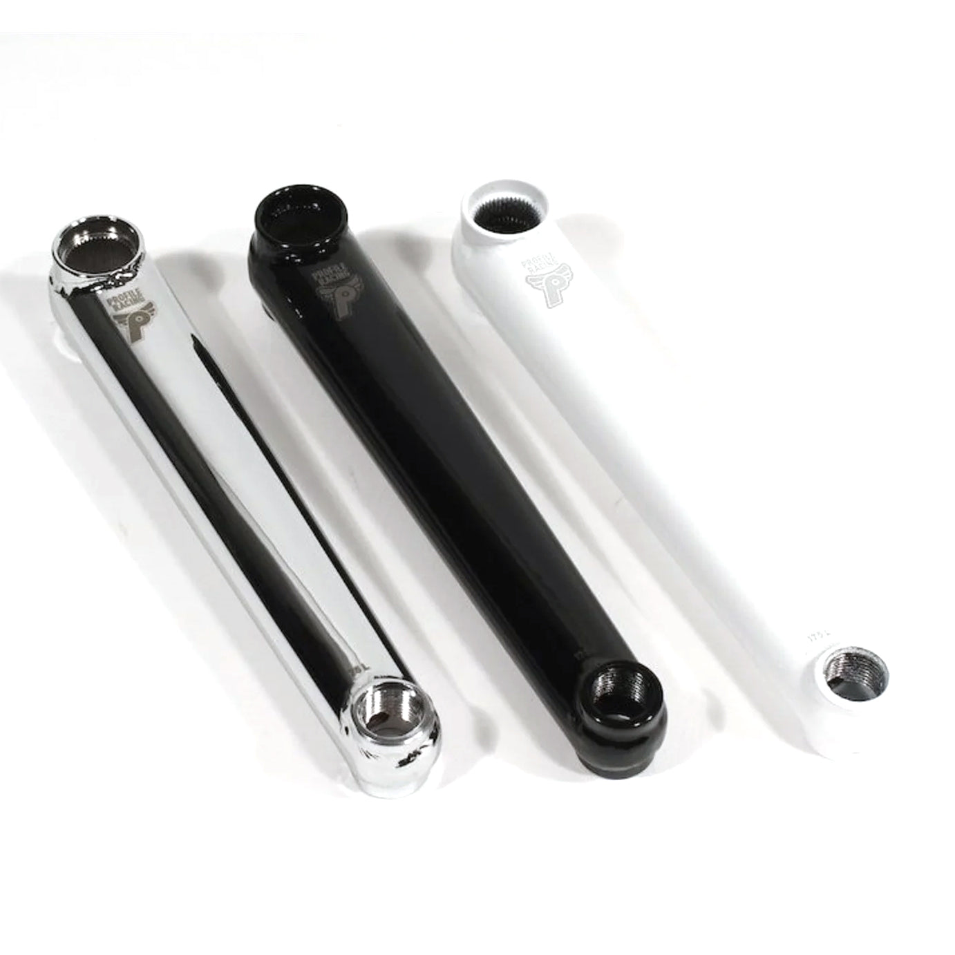 Three Profile Race Cranks in varying sizes and colors, black and white, with a 48 spline spindle, arranged diagonally on a plain background.