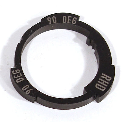 The Profile Z-Coaster Hub Slack Cam Ring is a black circular metal piece, inscribed with "90 DEG" and "RHD," featuring several edge notches that suggest its complex function in the Z Coaster™ hub.